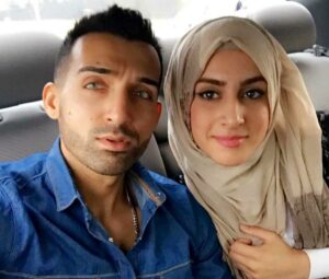 Sham Idrees with his wife in car